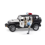 Bruder 02526 - Jeep Wrangler Rubicon Unlimited Polizeifahrzeug mit Polizist und Ausstattung